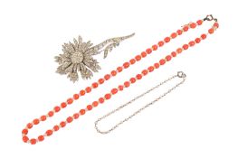 A 1950s flower brooch, a bracelet and a necklace.