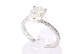 A hallmarked 18ct white gold diamond solitaire ring. Set with one oval brilliant cut diamond of 1.