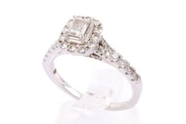 A platinum diamond set rectangular cluster ring.