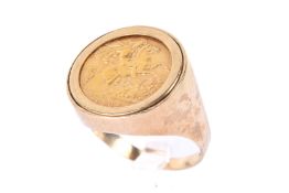 A 1907 half sovereign in a 9ct gold ring. Hallmarked to shank, size Y/Z, gross weight 10.8g.