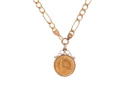 A 9ct gold mounted 1/10th kruger rand (1981) coin on a 9ct gold chain. Gross weight 8.4g.