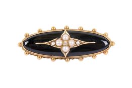 A 19th century yellow metal mourning brooch.