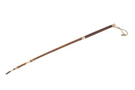 A late 19th century Swaine & Adeney 15ct gold mounted riding crop.