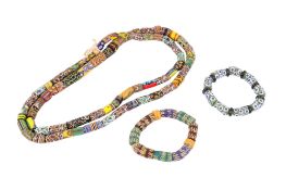 A group of Venetian/African trade style glass beads. Of cut tube form, various colours and patterns.