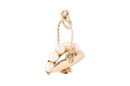 A 14ct gold and pearl pendant.