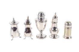 Five silver and silverplated salt and pepper pots.