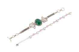 Two silver bracelets.