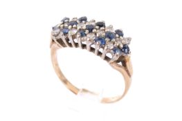 A diamond and sapphire cluster ring.