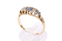 An 18ct gold, diamond and sapphire dress ring.