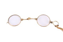 A pair of yellow metal pince nez. Unmarked, gross weight circa 14.3g.