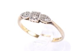 An 18ct three stone diamond ring.