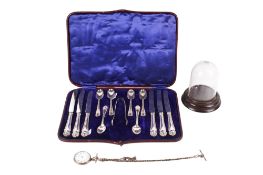 A set of silver handled butter knives and teaspoons and a silver pocket watch.