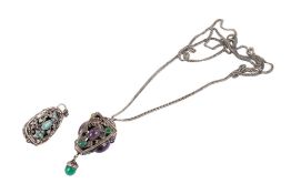 Two white metal and stone pendants.