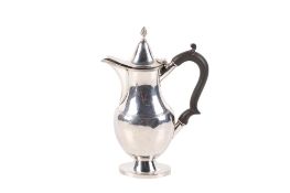 An early 20th century silver water pot.