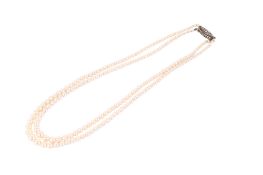 A double string of graduated cultured pearls.