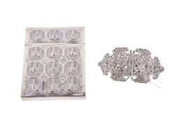 A Thai Sion white metal card etui and a belt buckle. The case marked 90, H9.6cm x W7.4cm x D0.