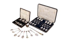 A small group of silver and silverplated flatware.