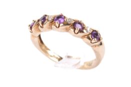 A 9ct gold, diamond and amethyst ring.