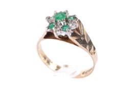 A 9ct gold, emerald and diamond dress ring.