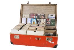 A collection of assorted 7 inch 45 rpm vinyl single records.