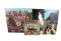 The Beatles - three vintage vinyl records. Consisting of Abbey Road, 1969, PCS 7088; Sgt.