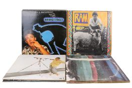 A collection of nine assorted LP vinyl album records.