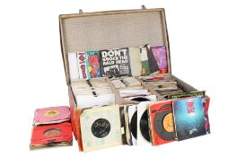 A collection of assorted 7 inch 45 rpm vinyl single records mostly 1970s. Including some Punk, etc.