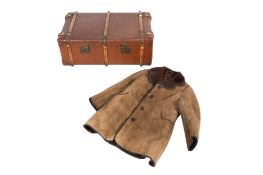 A gentleman's jacket and a vintage trunk.