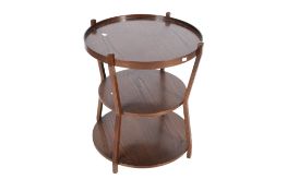 A 20th century oak circular table.