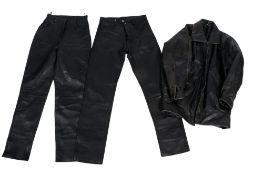 Two pairs of vintage leather trousers and a jacket.