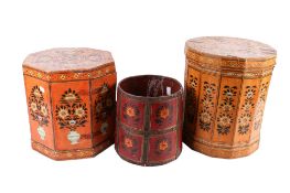 A vintage wooden bucket and two papier mache stools.