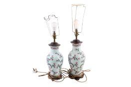 A pair of floral ceramic table lamps.