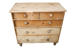 A Victorian scrubbed pine chest of drawers.