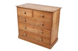 A vintage pitch pine chest of drawers.