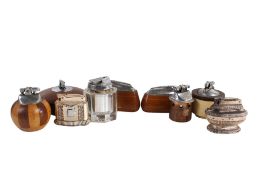 Nine vintage Ronson table lighters.