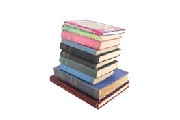 A collection of assorted vintage books, mostly signed or with letters from the authors.