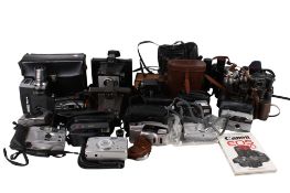 A collection of vintage film cameras and binoculars.