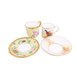 Two Royal Worcester Connoisseur Collection coffee cans and saucers. Circa.