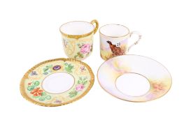 Two Royal Worcester Connoisseur Collection coffee cans and saucers. Circa.
