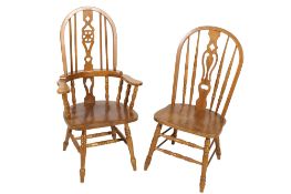 Two contemporary oak chairs.