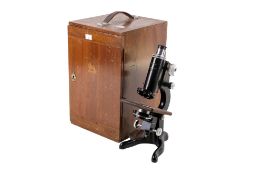 A cased Watson & Sons Ltd 'Service' microscope.