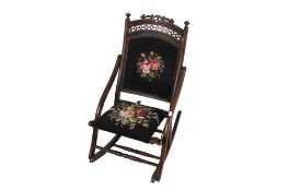 A late Victorian folding rocking chair.