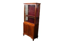 An early 20th century mahogany display cabinet.