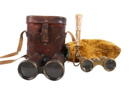 A pair of Lemaire Fabi binoculars and a pair of mother-of-pearl opera glasses.