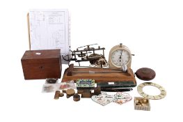 A mixed lot of collectables. Including a scratch built desk toy, timepiece and a tea caddy, etc.