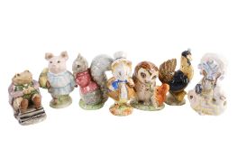 A collection of seven assorted Beswick Beatrix Potter characters. Including Mr.