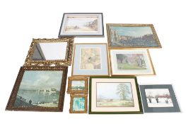 A collection of assorted framed pictures and a mirror.