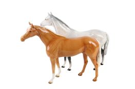 Two large ceramic Beswick horses.