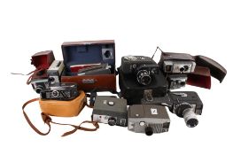 A collection of vintage video cameras. To include a Kodak Automatic 8 movie camera, G.B.