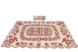 A pair of vintage embroidered tablecloths. Having scalloped edges and red floral decoration.